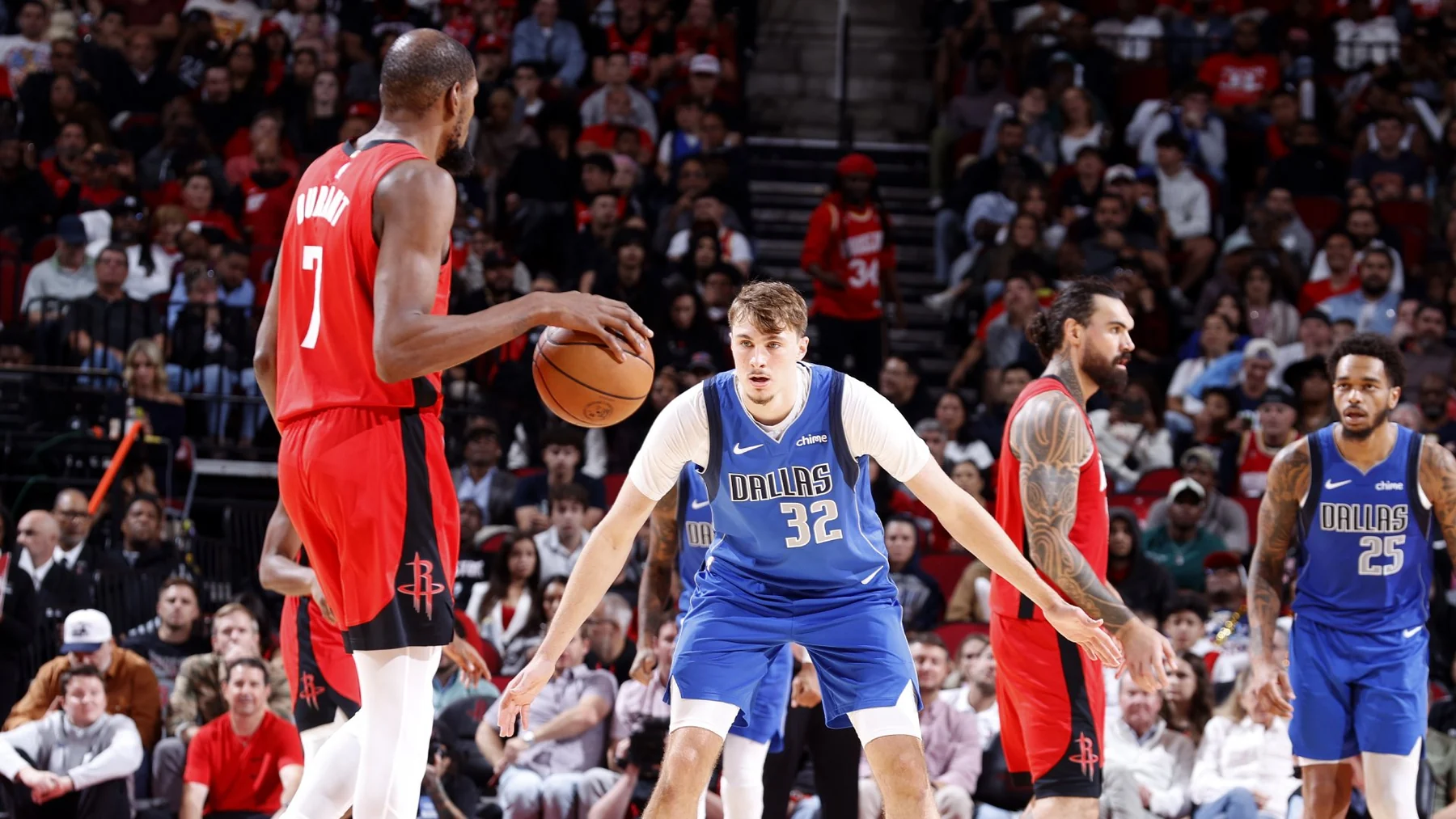 Cooper Flagg guards Kevin Durant during a Dallas Mavericks versus Houston Rockets game
