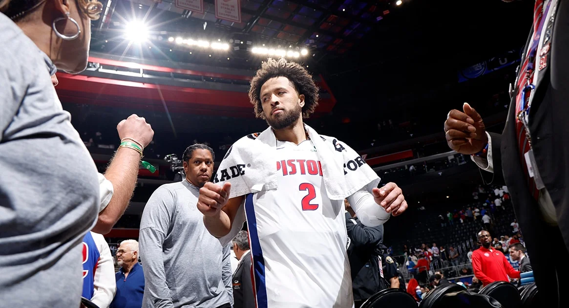 Cade Cunningham greets Detroit Pistons fans inside Little Caesars Arena after a 2026 playoff game