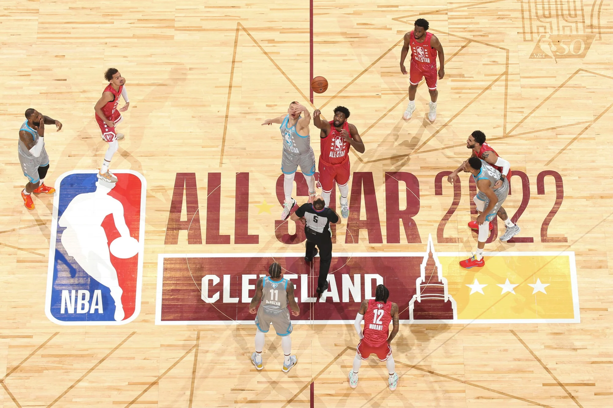 Opening tip of the 2022 NBA All-Star Game on the league's NBA 75 anniversary court