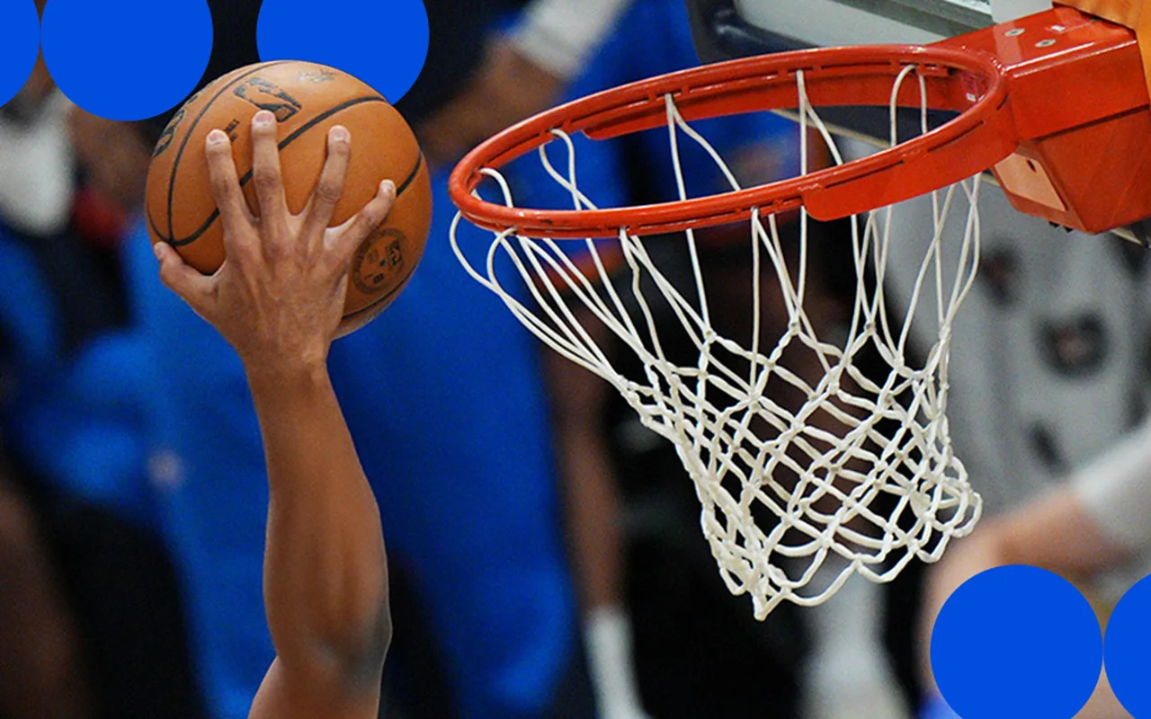 NBA game action viewed from close to the court