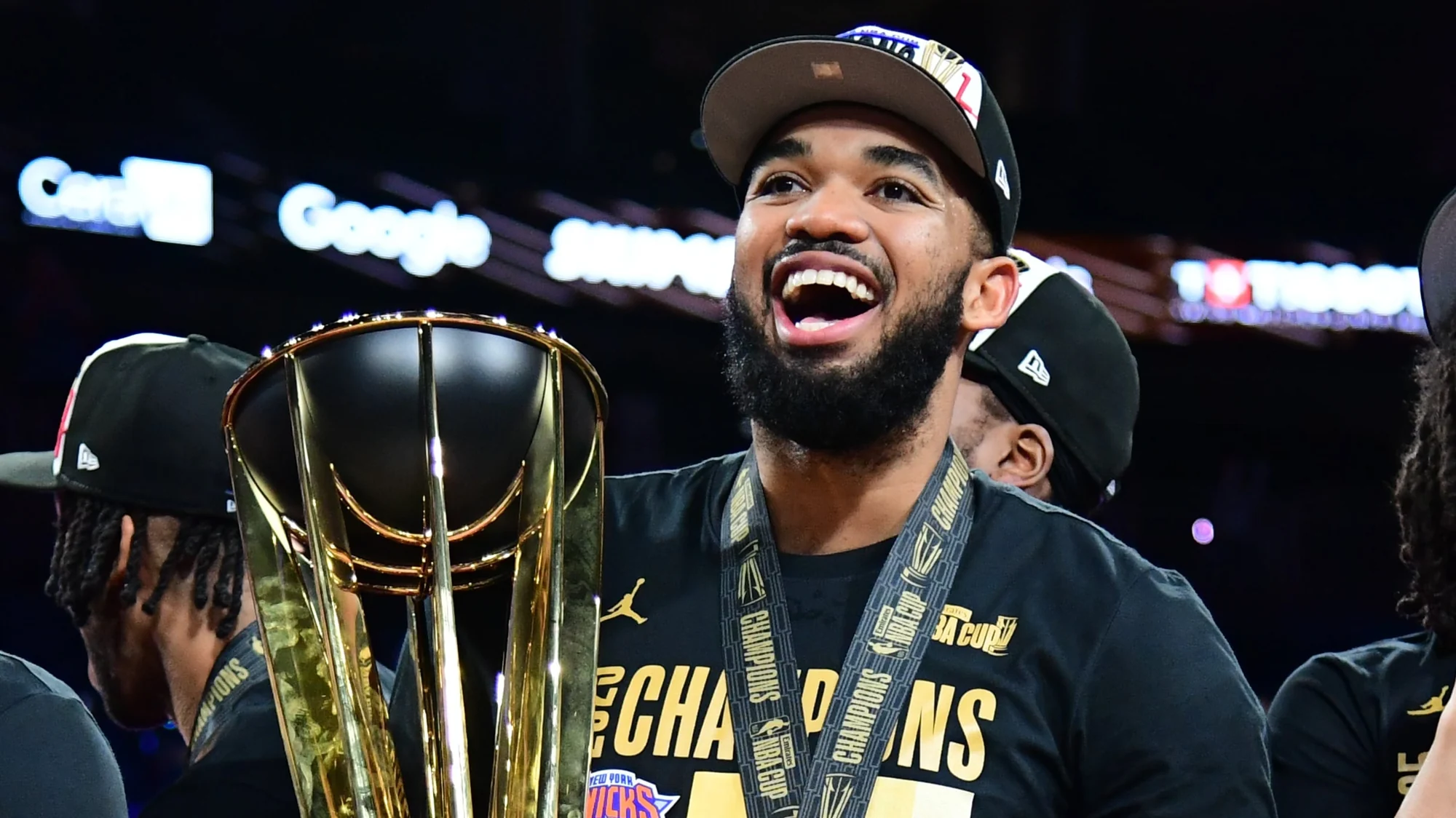 Karl-Anthony Towns holding the trophy after the New York Knicks won the 2025 NBA Cup