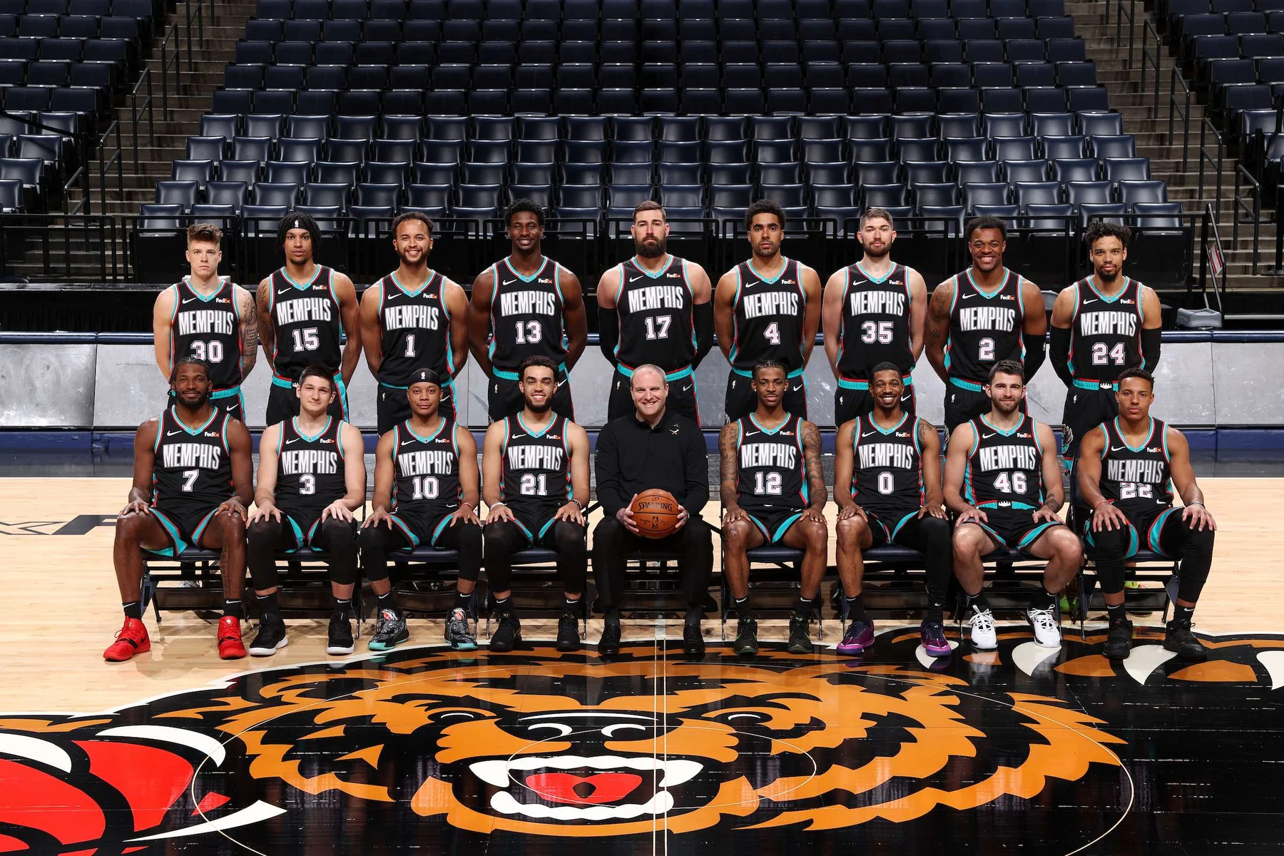 Memphis Grizzlies players wearing uniforms that preserve the franchise bear identity